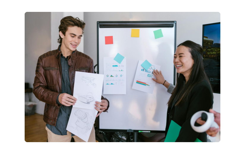 Team collaborating on affiliate marketing strategies, sharing creative ideas and data insights on a whiteboard.